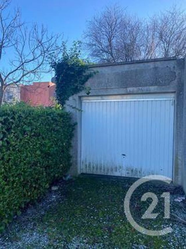 Afficher la photo en grand parking à vendre - 15.0 m2 - MAUBEUGE - 59 - NORD-PAS-DE-CALAIS - Century 21 Terre Du Nord