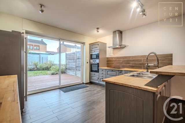 maison à louer - 5 pièces - 80.0 m2 - HAUTMONT - 59 - NORD-PAS-DE-CALAIS - Century 21 Terre Du Nord