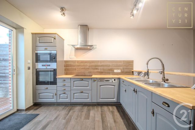 maison à louer - 5 pièces - 80.0 m2 - HAUTMONT - 59 - NORD-PAS-DE-CALAIS - Century 21 Terre Du Nord